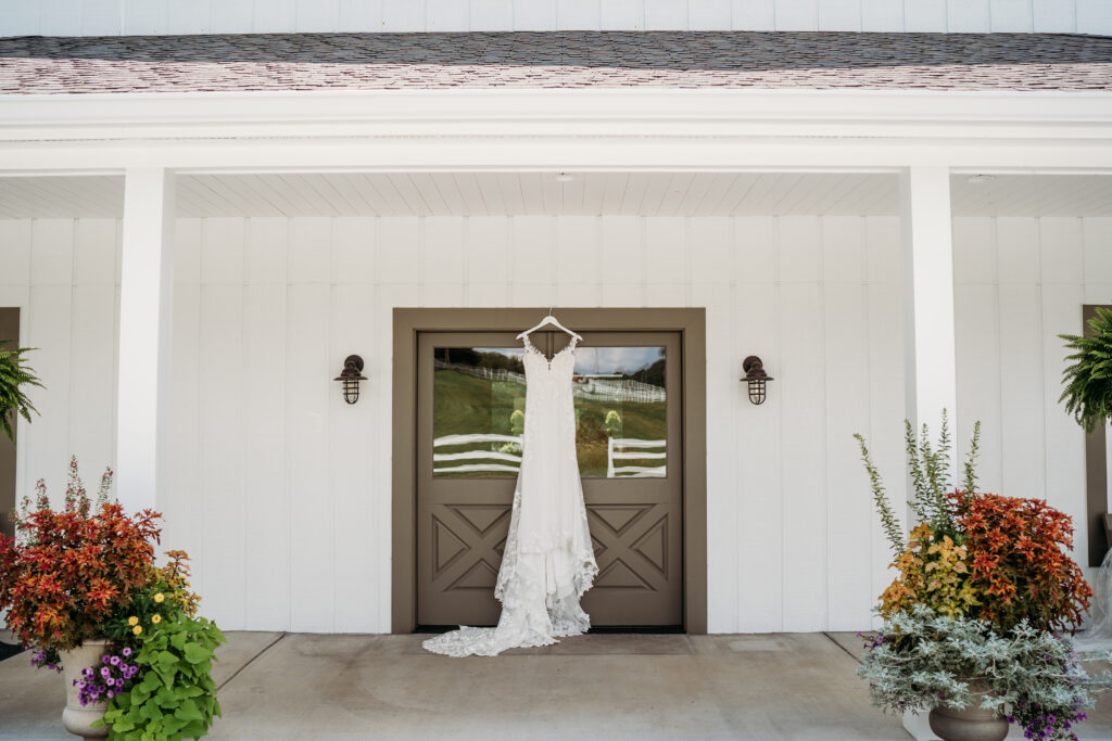 wedding-dress-hanging-on-door